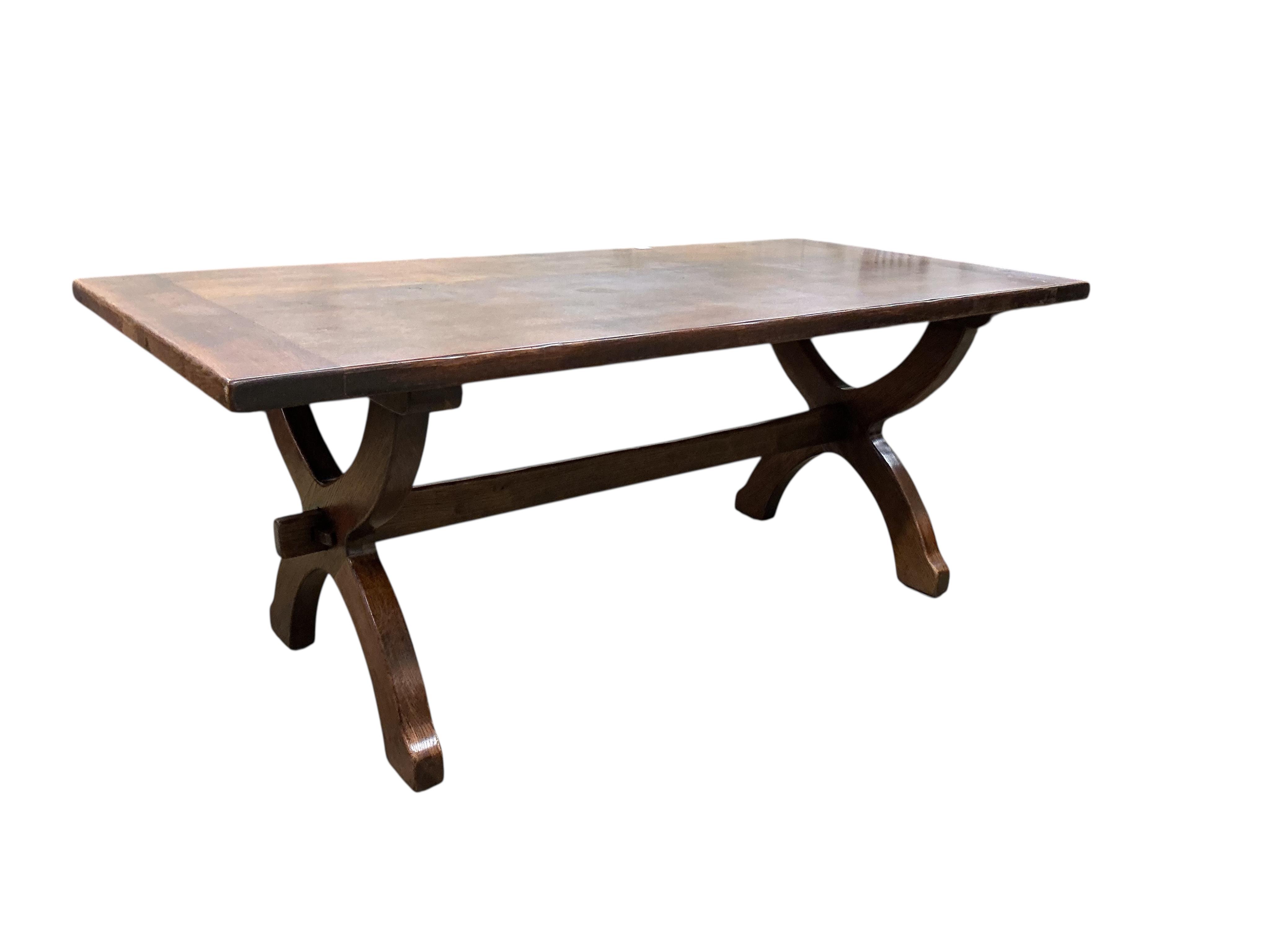 An 18th century style rectangular oak tavern or refectory dining table, width 197cm, depth 95cm, height 76cm
